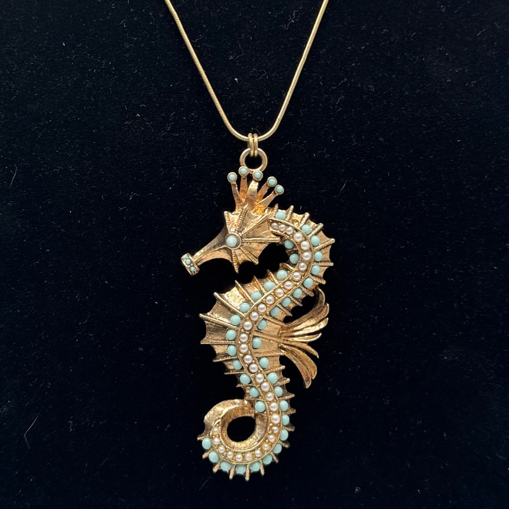 Seahorse gold tone necklace